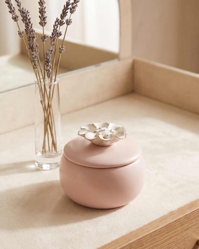 The Quiet Hours lavender soy candle in its ceramic vessel with a bamboo lid