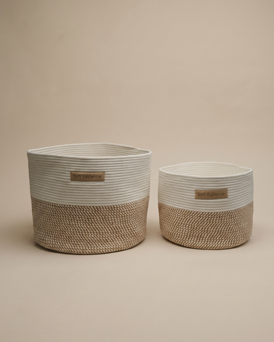 Two Soft Existence woven cotton rope baskets in cream and natural jute, shown side by side