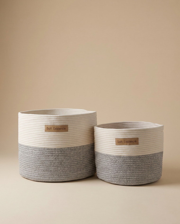 The Soft Existence woven cotton rope basket set in cream and natural jute, large and small sizes together