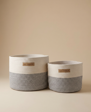 Woven cotton storage basket set in white and grey, styled on a warm neutral background - Soft Existence